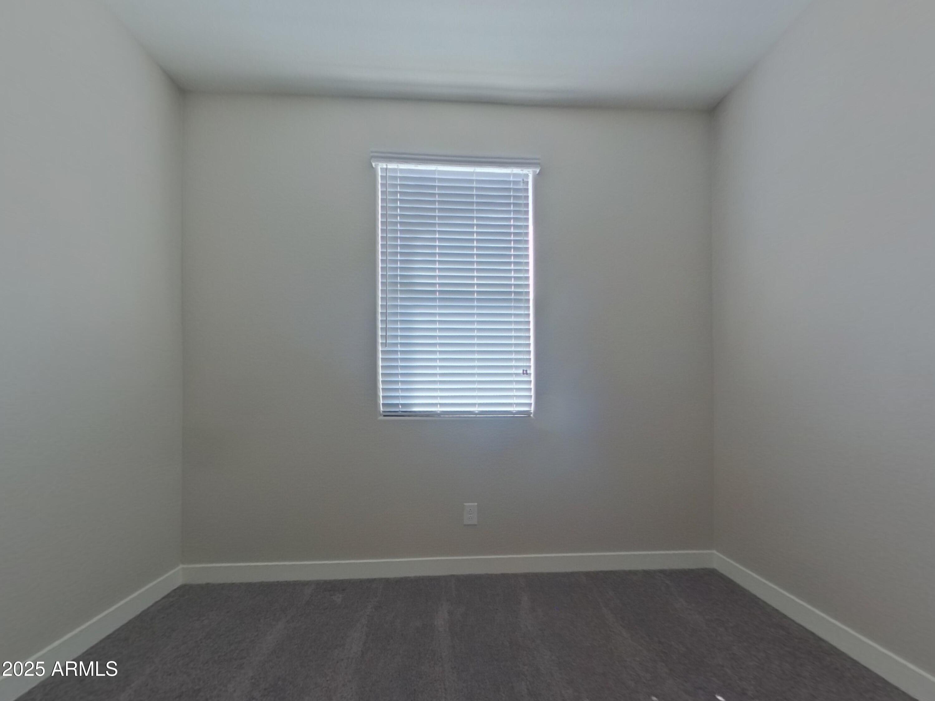 2929 North 28th Street, Unit 13 Phoenix, AZ 85016 - Photo 9 of 16 an empty room with a window