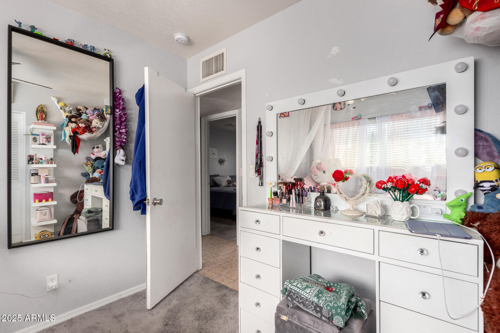 12608 West Lower Buckeye Road Avondale, AZ 85323 - Photo 20 of 26 a room with storage and utility room