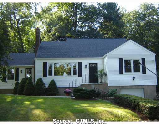812 Alling Road Orange, CT 06477 - Photo 1 of 1 a front view of a house with a yard