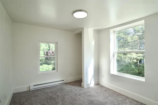 an empty room with windows