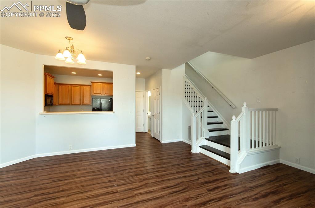 1316 Walters Point Monument, CO 80132 - Photo 12 of 33 a view of entryway and hall with wooden floor