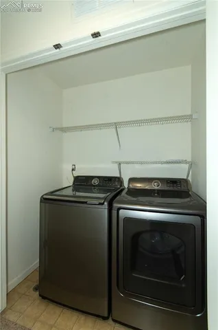 a stove top oven sitting inside of a kitchen