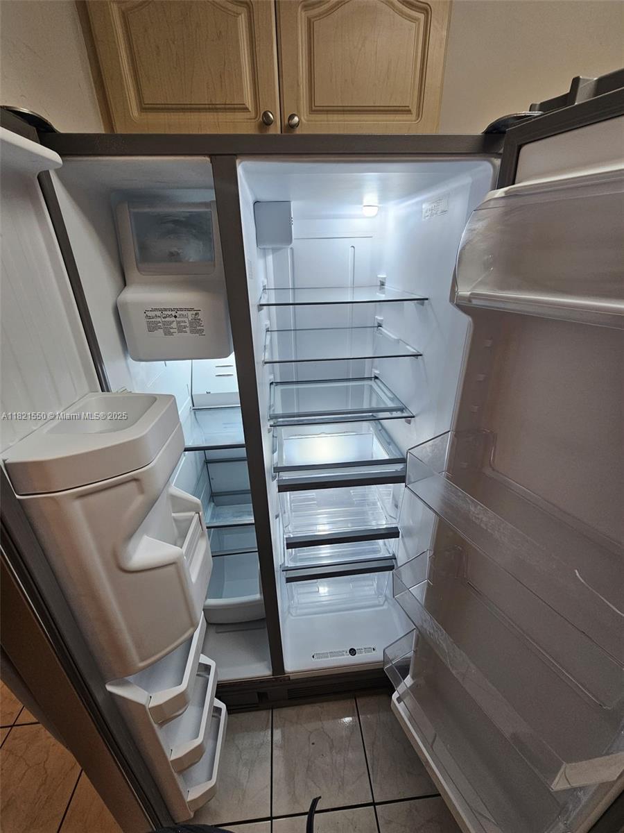 1555 West 44th Place, Unit 221B Hialeah, FL 33012 - Photo 14 of 15 a view of storage and utility room