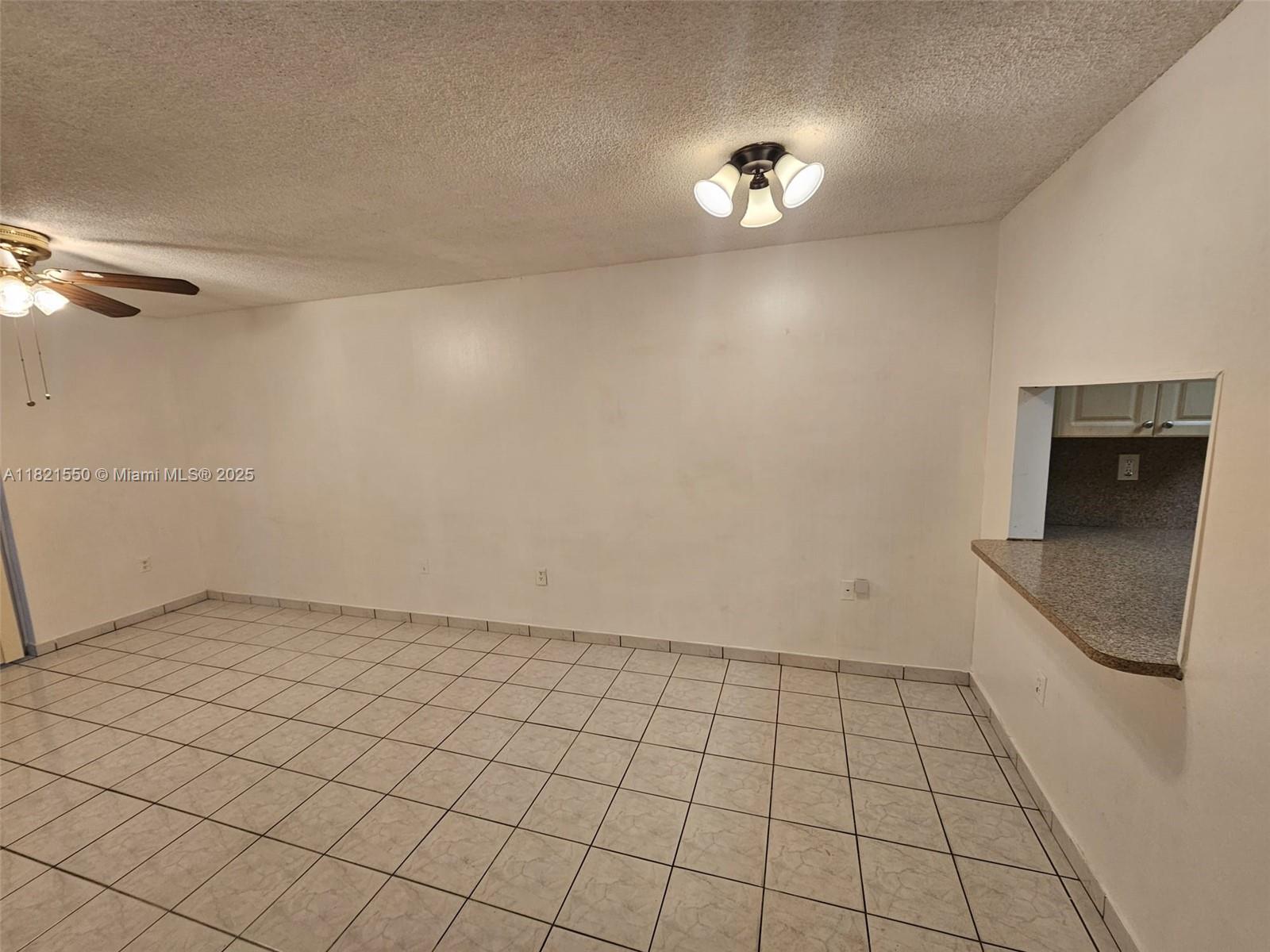 1555 West 44th Place, Unit 221B Hialeah, FL 33012 - Photo 2 of 15 a view of an empty room