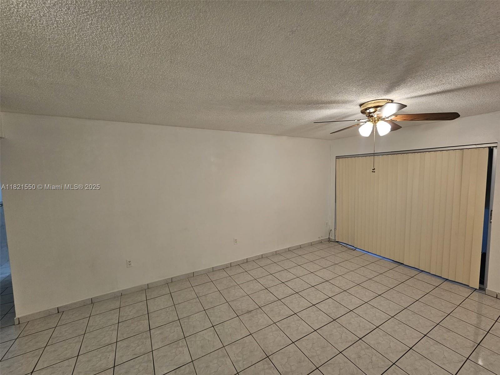 1555 West 44th Place, Unit 221B Hialeah, FL 33012 - Photo 8 of 15 a view of an empty room