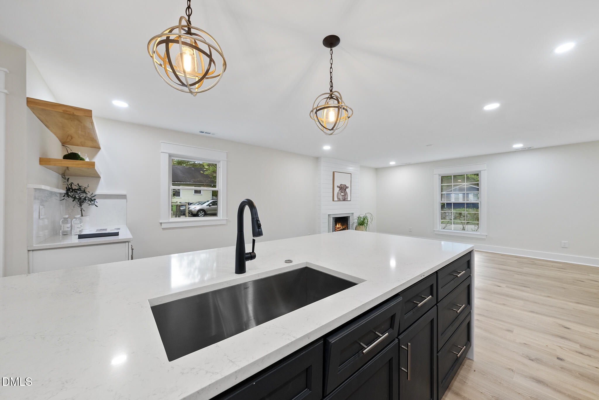 7804 Brandyapple Drive Raleigh, NC 27615 - Photo 16 of 58 a kitchen with stainless steel appliances a counter space a sink and cabinets