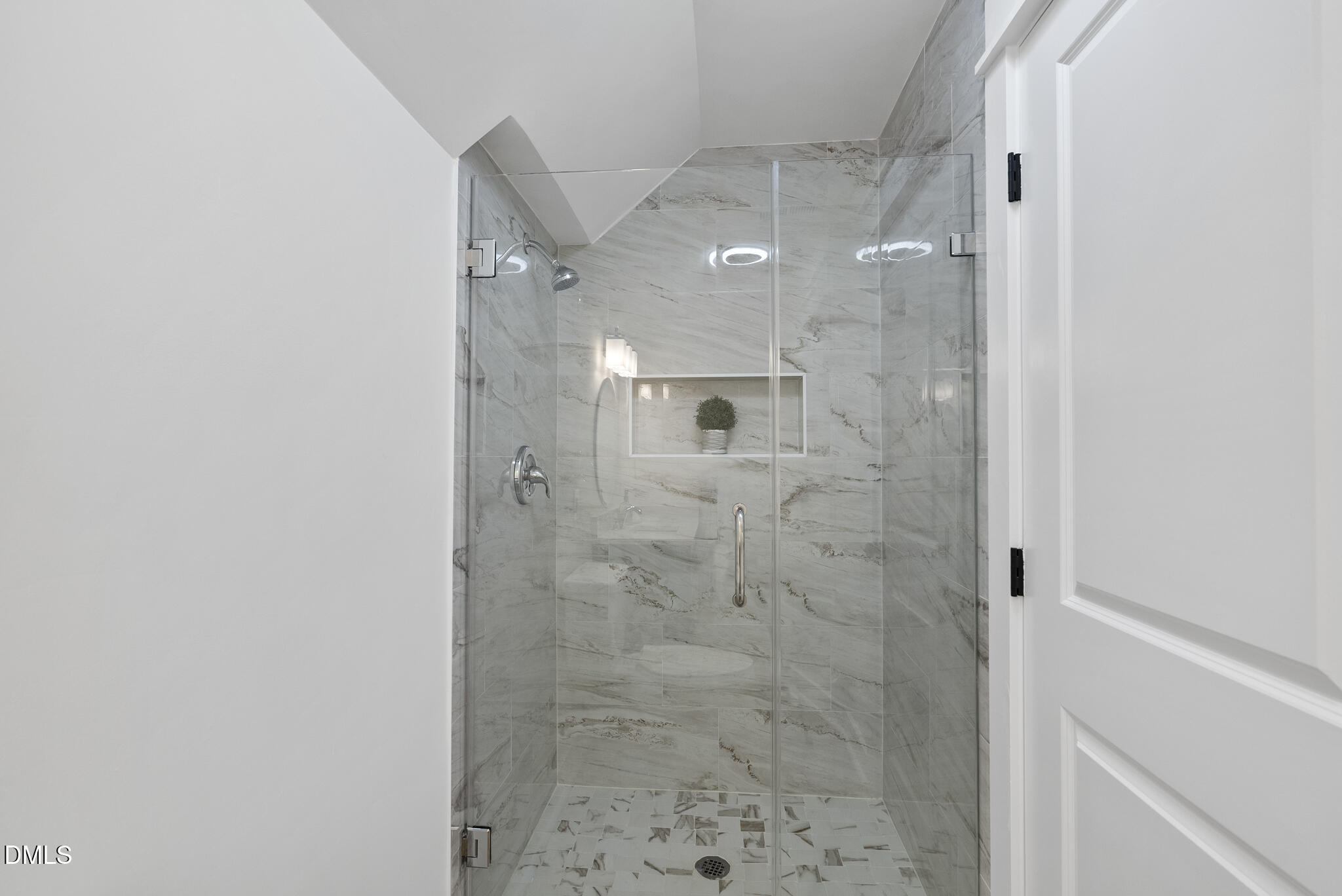 7804 Brandyapple Drive Raleigh, NC 27615 - Photo 36 of 58 a bathroom with a shower