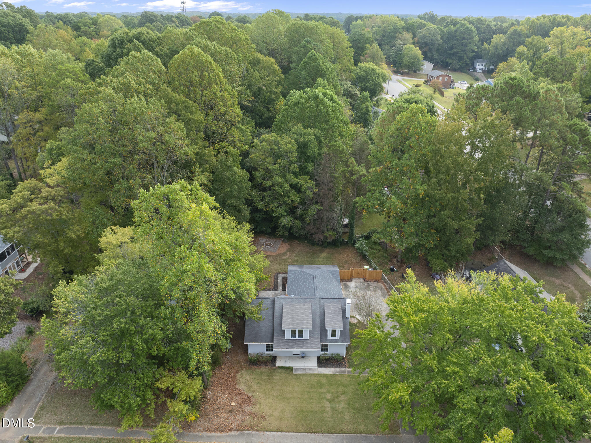 7804 Brandyapple Drive Raleigh, NC 27615 - Photo 4 of 58 an aerial view of a house with a yard and large tree