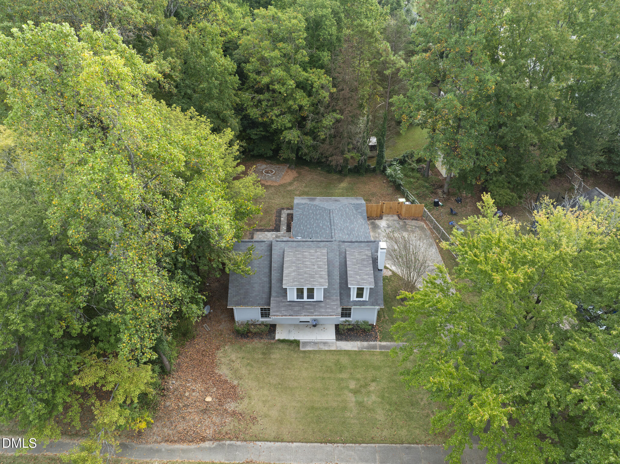 7804 Brandyapple Drive Raleigh, NC 27615 - Photo 41 of 58 an aerial view of a house with a yard basket ball court and outdoor seating