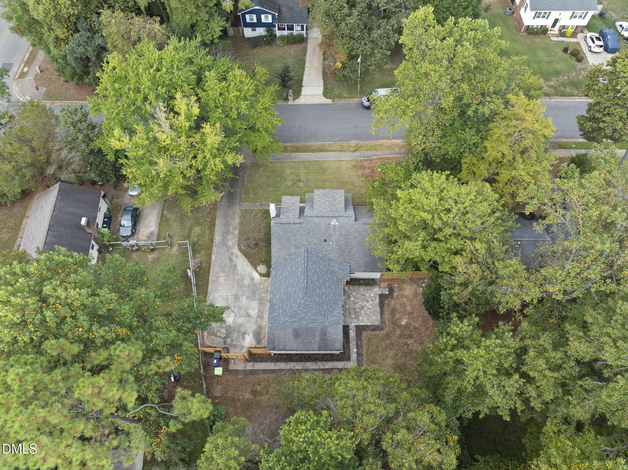 7804 Brandyapple Drive Raleigh, NC 27615 - Photo 44 of 58 an aerial view of a house with outdoor space and trees all around