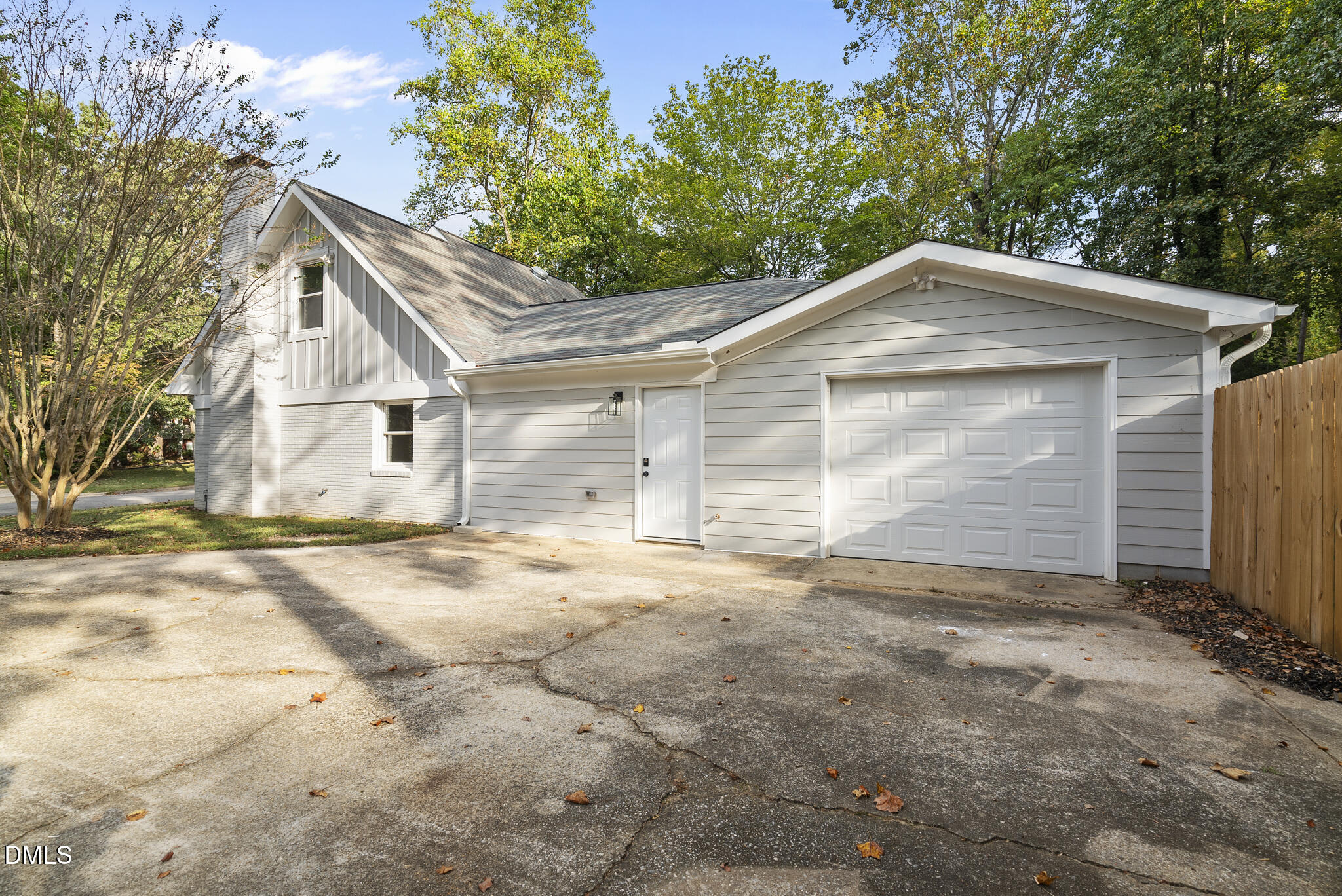 7804 Brandyapple Drive Raleigh, NC 27615 - Photo 48 of 58 a front view of a house with a garage