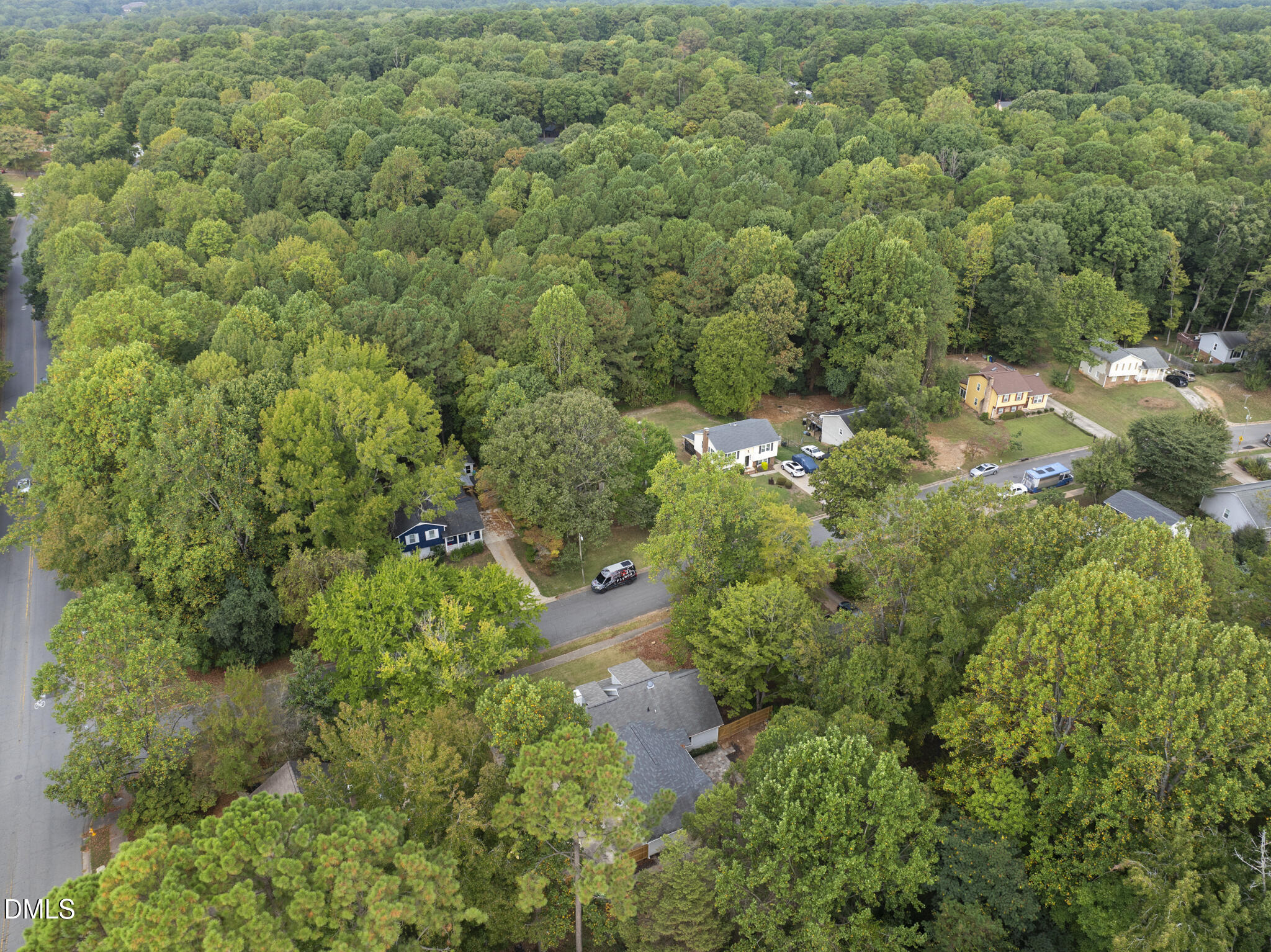 7804 Brandyapple Drive Raleigh, NC 27615 - Photo 55 of 58 an aerial view of residential house with outdoor space and trees all around