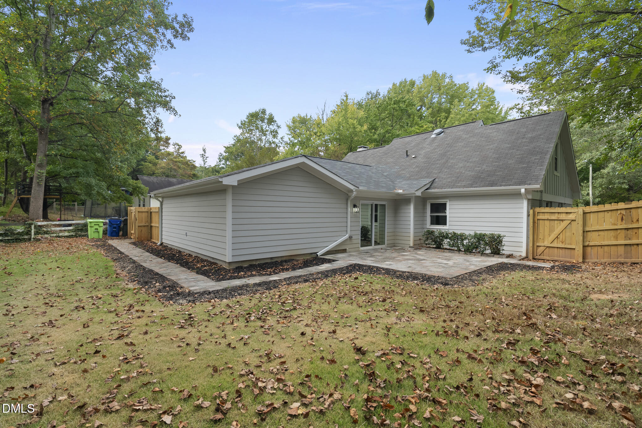 7804 Brandyapple Drive Raleigh, NC 27615 - Photo 57 of 58 a view of a house with a yard and large tree