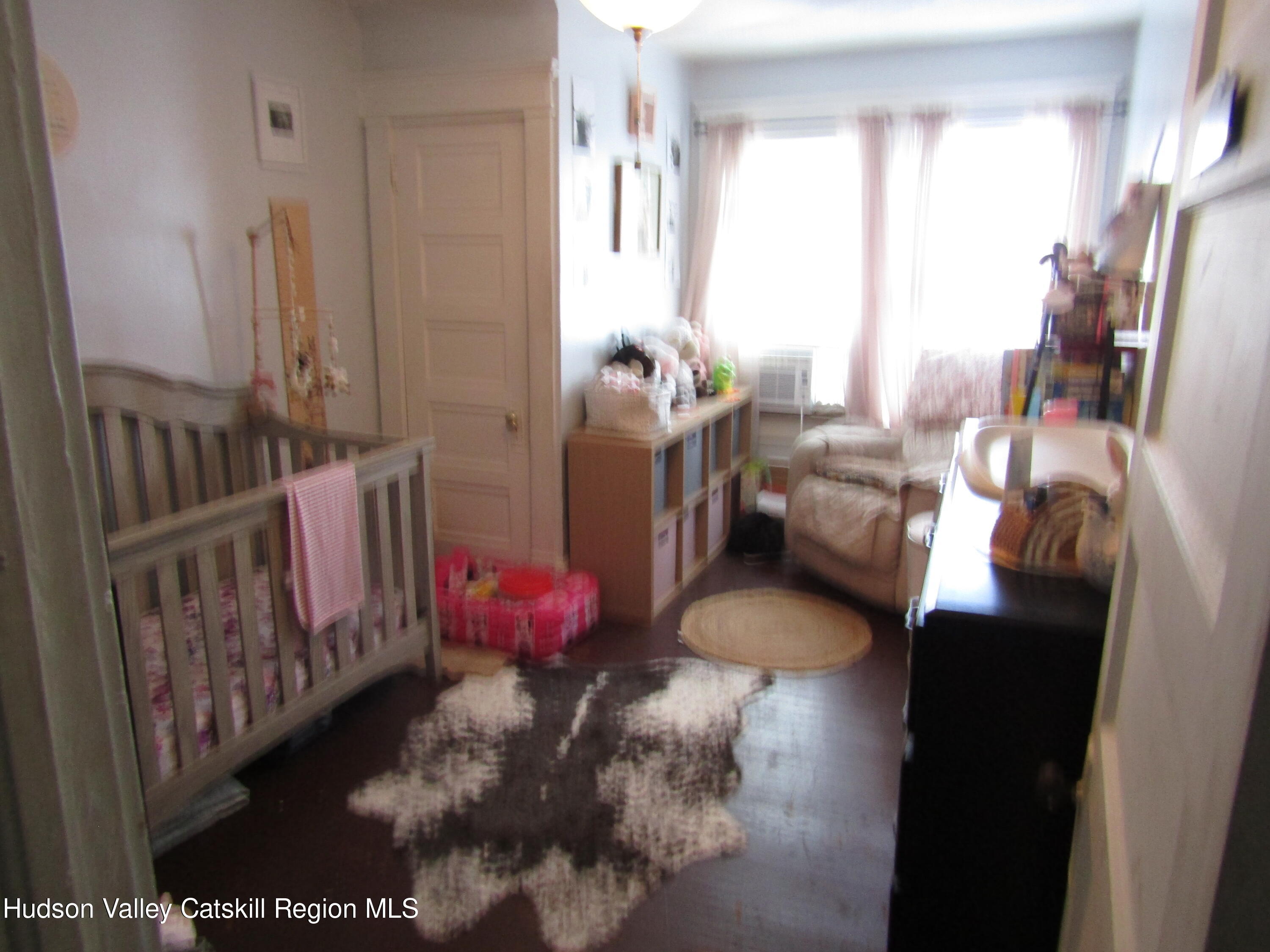 113 Pine Street Kingston, NY 12401 - Photo 9 of 21 a view of living room with furniture and a fireplace