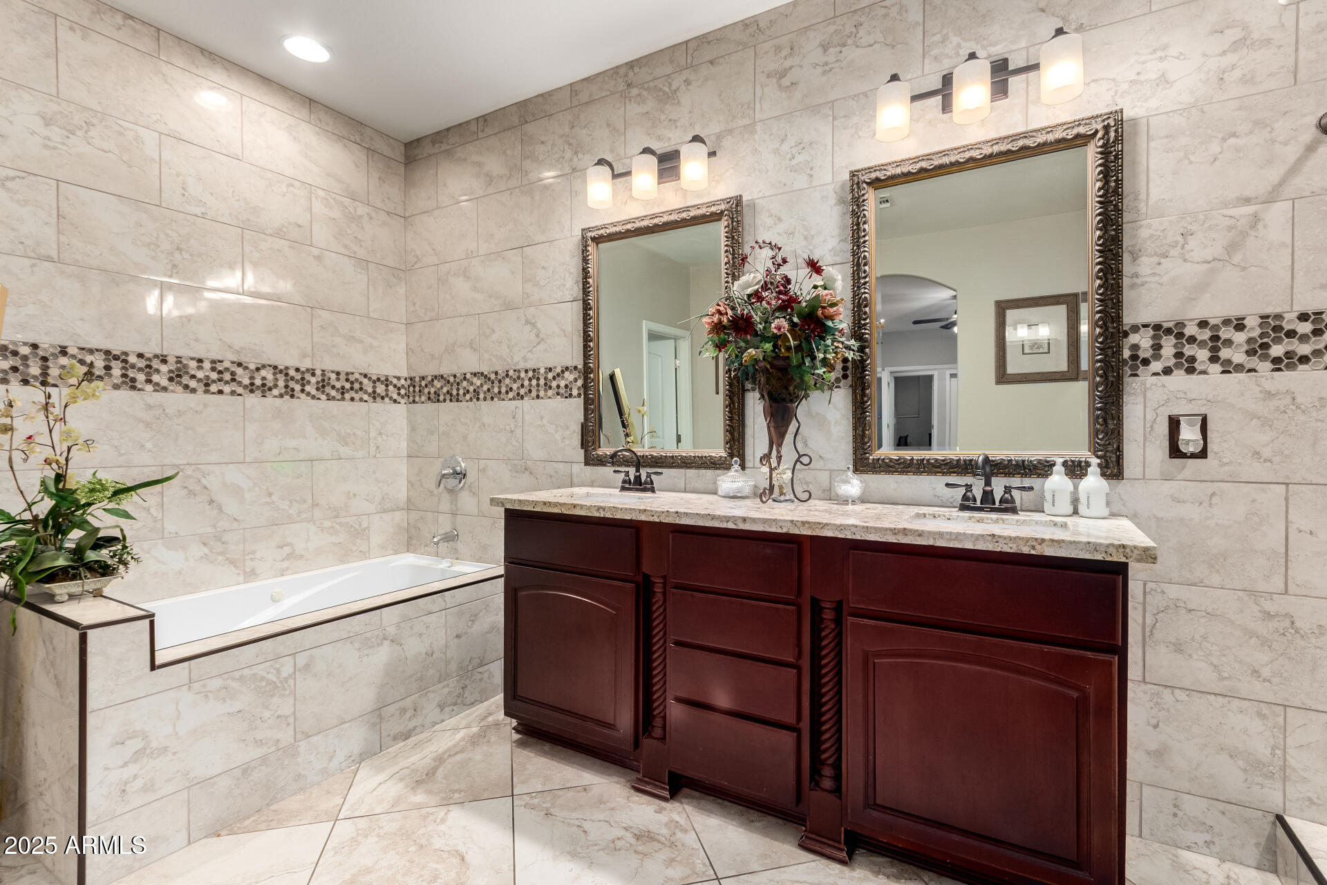 6344 West Lamar Road Glendale, AZ 85301 - Photo 29 of 37 a bathroom with a sink and mirror