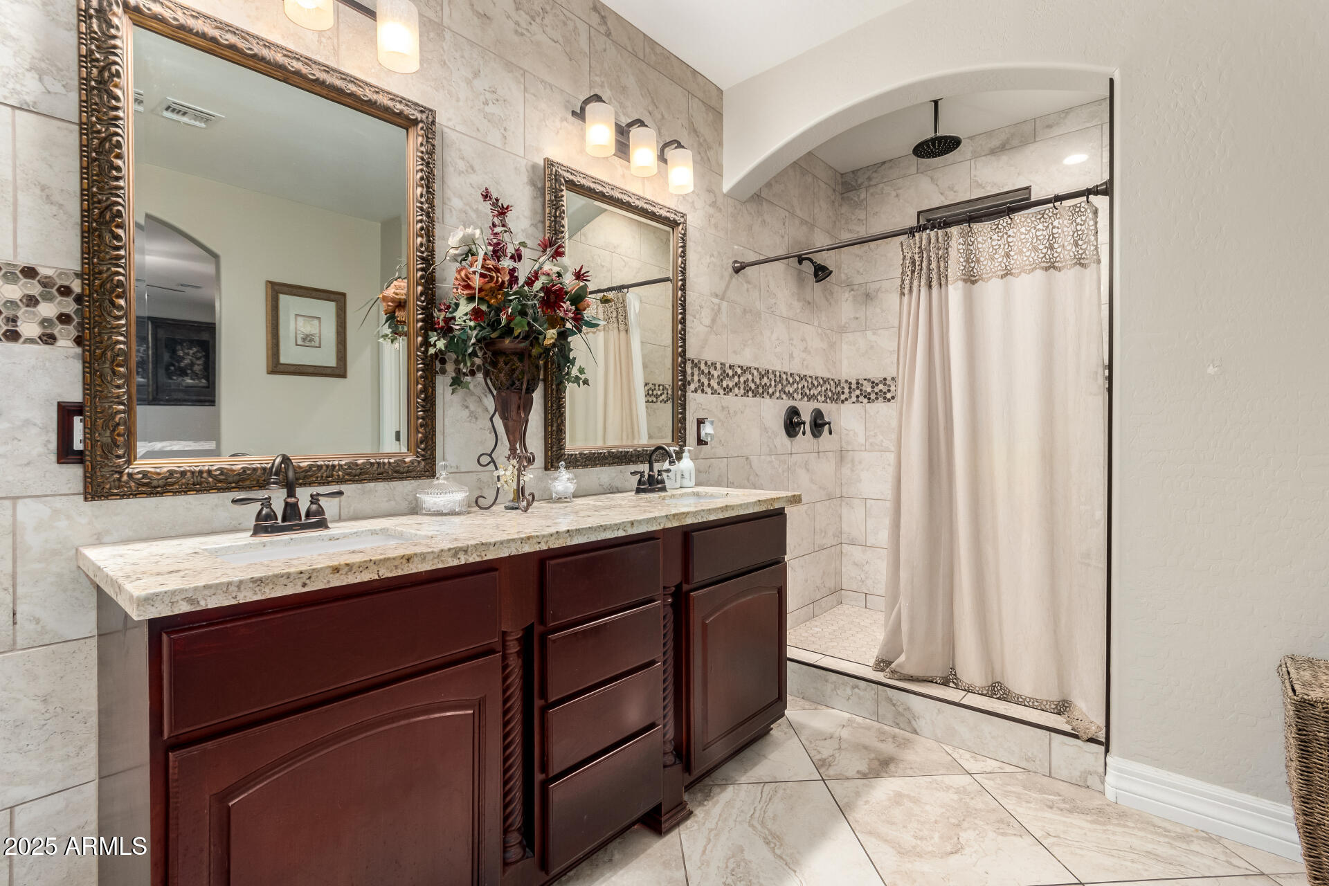 6344 West Lamar Road Glendale, AZ 85301 - Photo 30 of 37 a bathroom with a double vanity sink mirror and shower