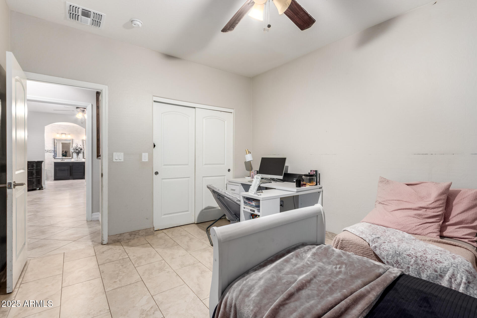 6344 West Lamar Road Glendale, AZ 85301 - Photo 32 of 37 a living room with a couch and a view of living room
