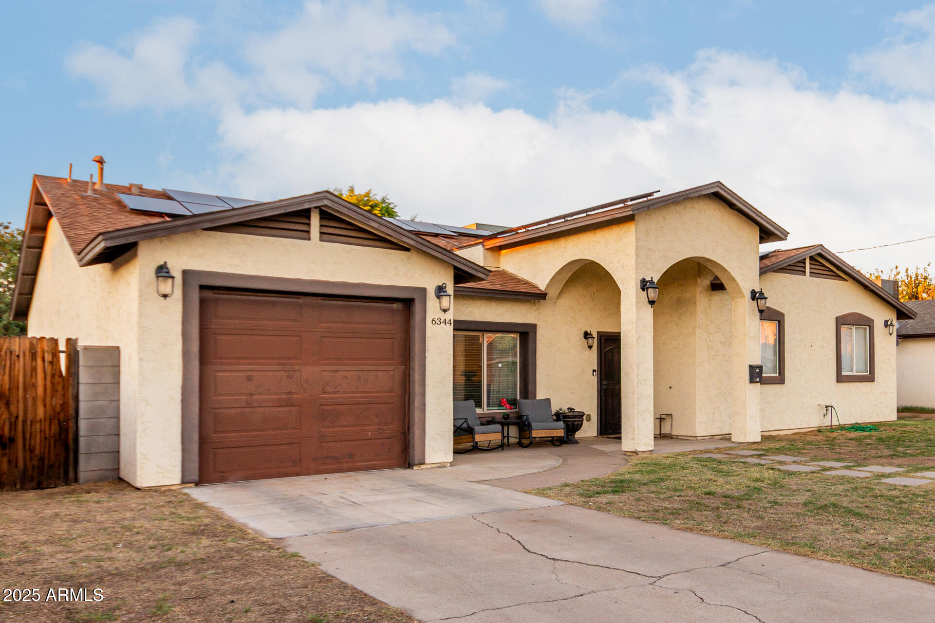 6344 West Lamar Road Glendale, AZ 85301 - Photo 9 of 37 a view of a house with a outdoor space