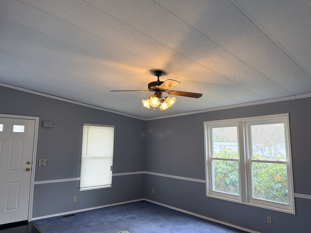 2 Emerald Place Raynham, MA 02767 - Photo 3 of 16 a window in an empty room with a window