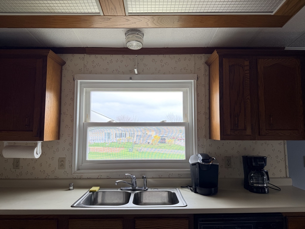 2 Emerald Place Raynham, MA 02767 - Photo 6 of 16 a view of two windows and a sink