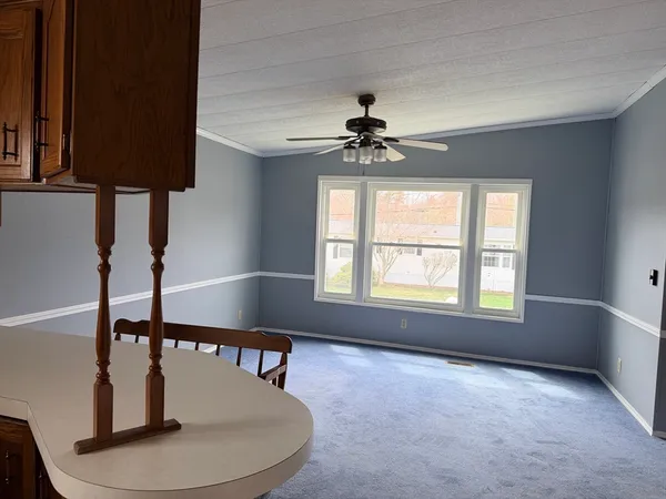 a view of entryway and hall with a window