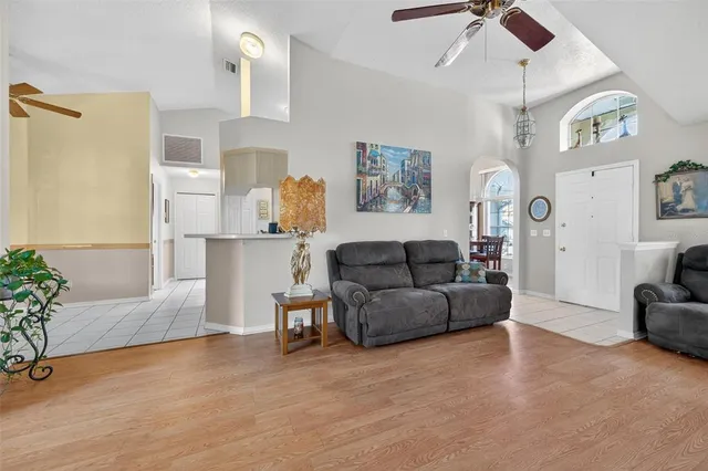 a kitchen with stainless steel appliances a stove a microwave sink and cabinets