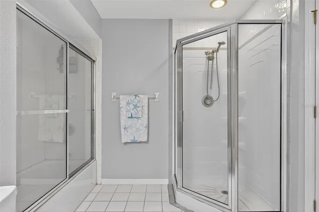 a view of a room with wooden floor and windows