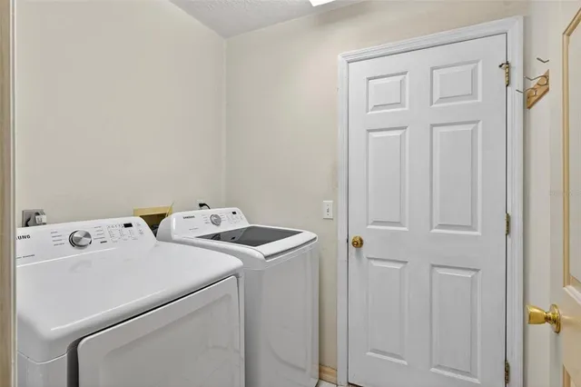 a view of a house with porch and wooden floor
