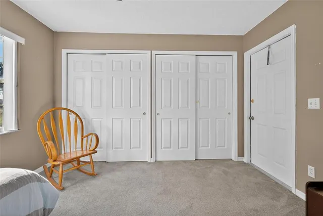 a front view of house with yard outdoor seating and barbeque oven