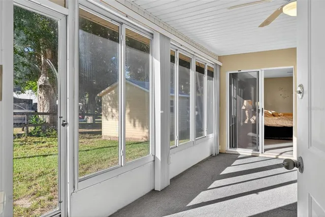 a front view of a house with yard and green space