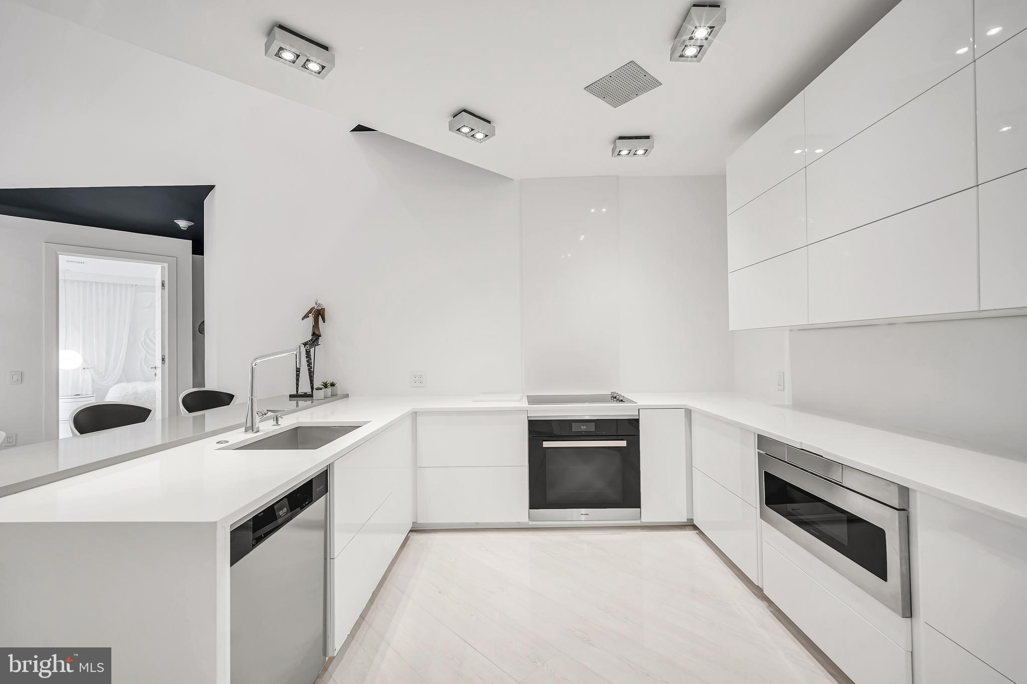 554 Carson Terrace Huntingdon Valley, PA 19006 - Photo 17 of 39 a kitchen with sink a stove and oven