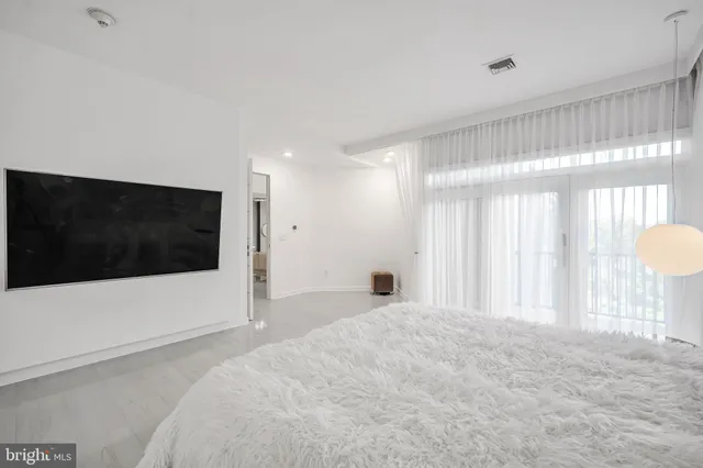 a view of a livingroom with a flat screen tv