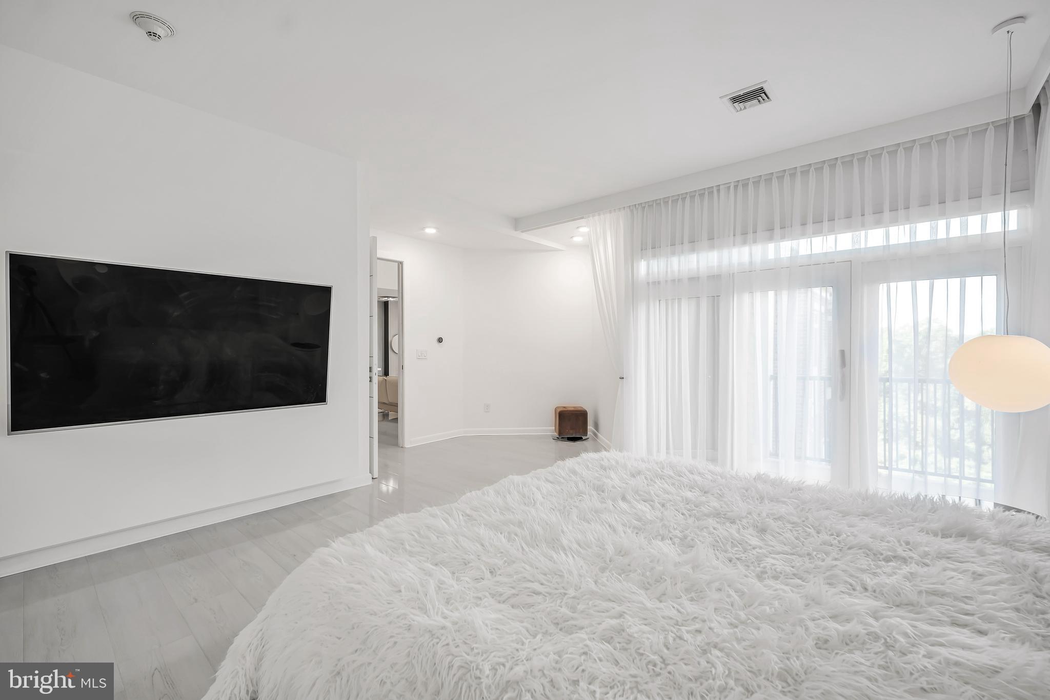 554 Carson Terrace Huntingdon Valley, PA 19006 - Photo 21 of 39 a view of a livingroom with a flat screen tv