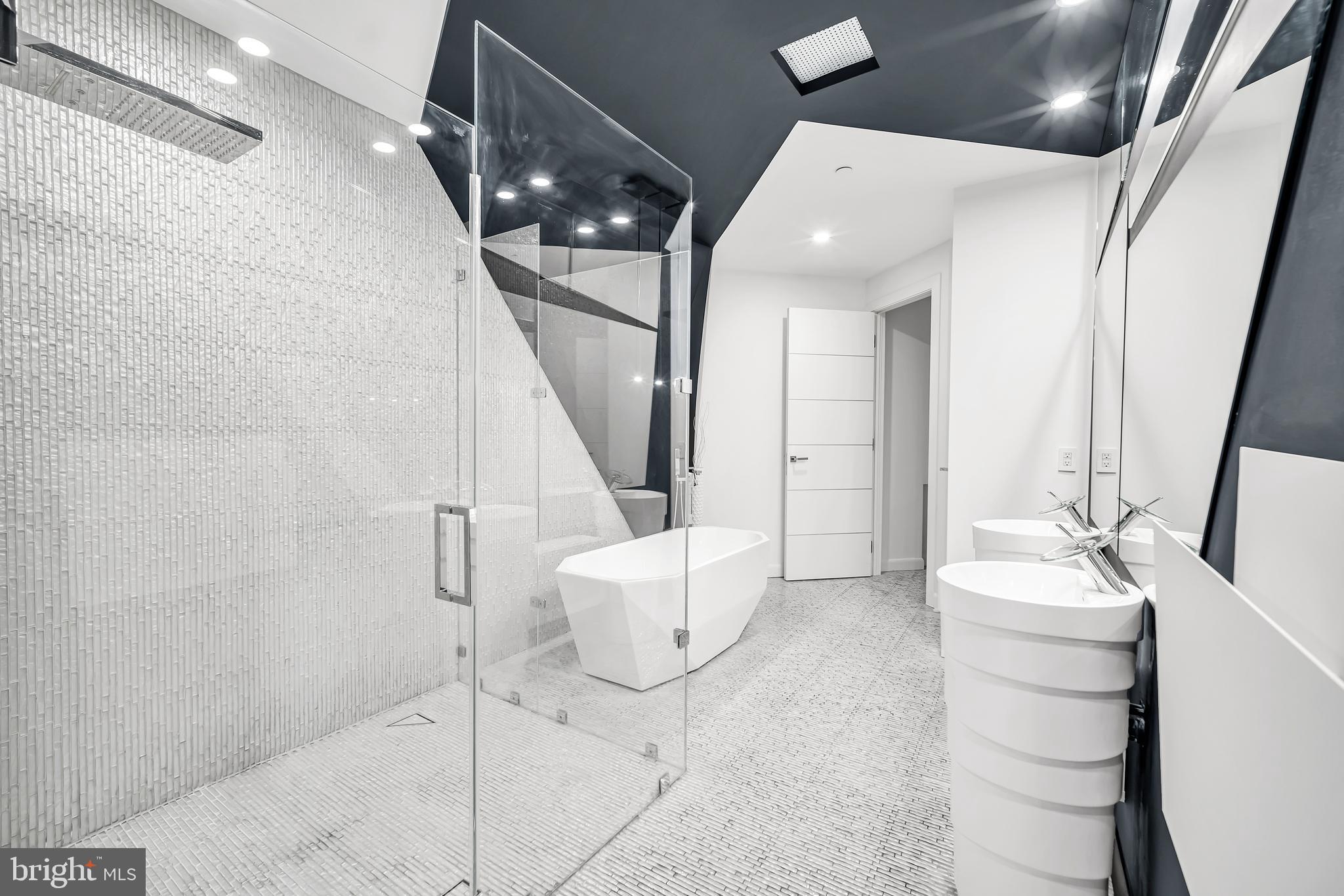 554 Carson Terrace Huntingdon Valley, PA 19006 - Photo 23 of 39 a bathroom with a sink a toilet and shower