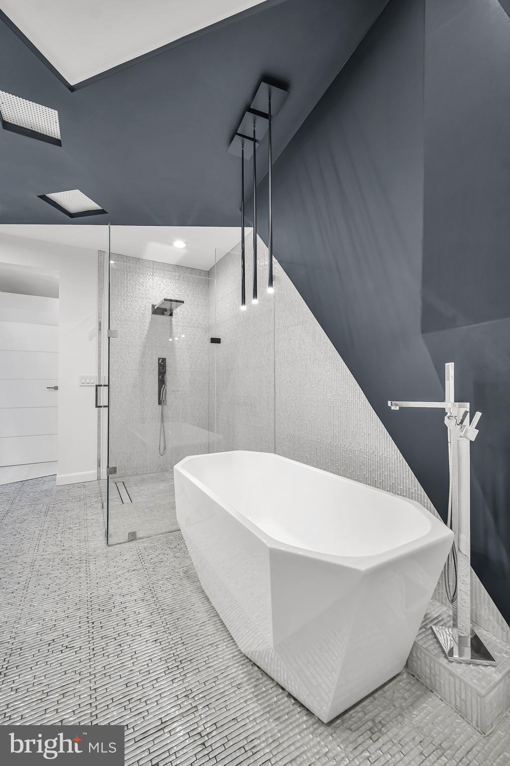 554 Carson Terrace Huntingdon Valley, PA 19006 - Photo 25 of 39 a white bath tub sitting in a bathroom