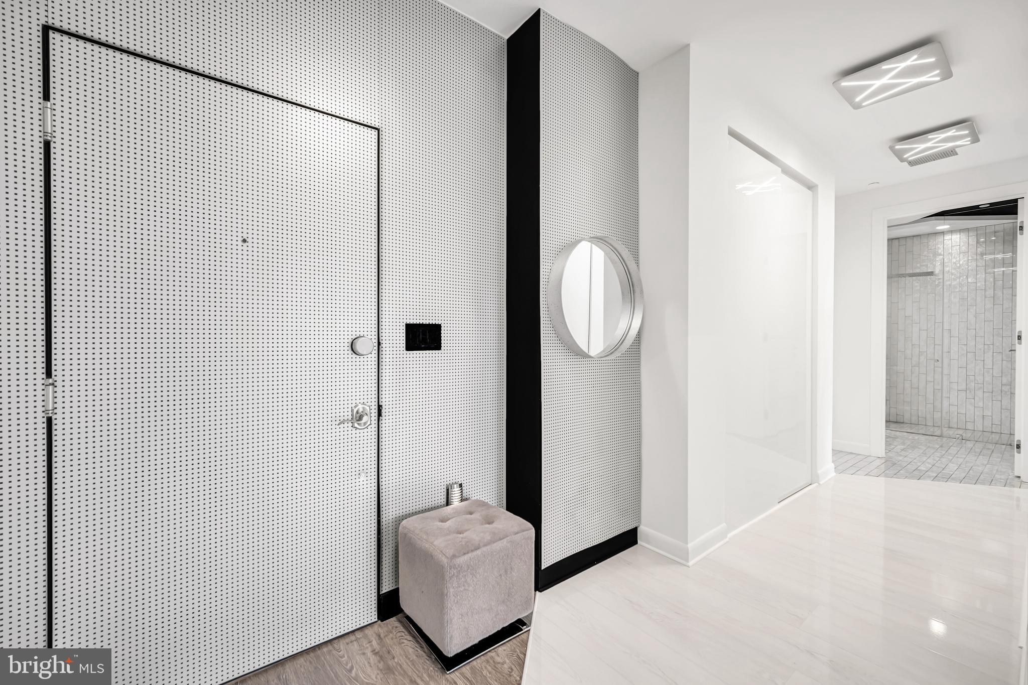 554 Carson Terrace Huntingdon Valley, PA 19006 - Photo 26 of 39 a view of a livingroom with bathroom and mirror