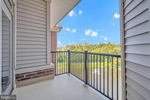 a view of a balcony with city view