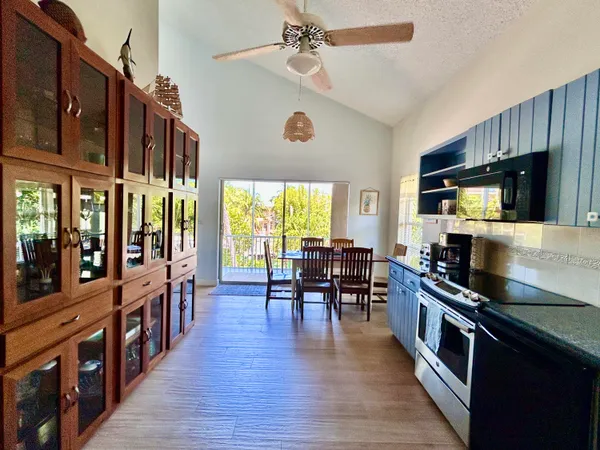 a kitchen with granite countertop lots of counter top space