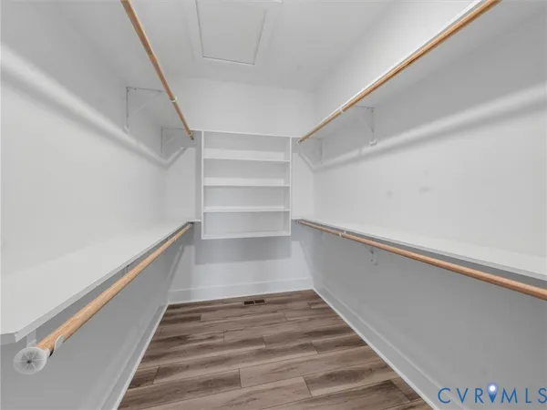 a view of an empty walk in closet
