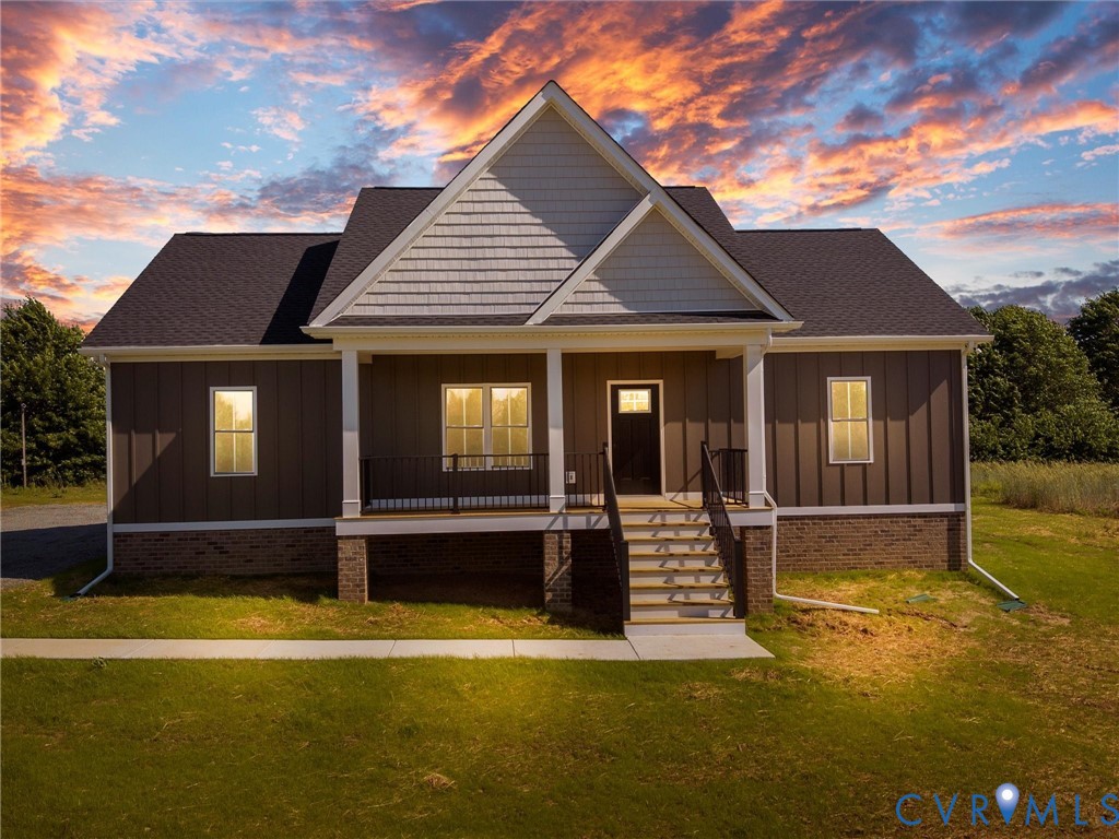 3289 Cumberland Road Cumberland, VA 23040 - Photo 2 of 29 a front view of a house with a yard