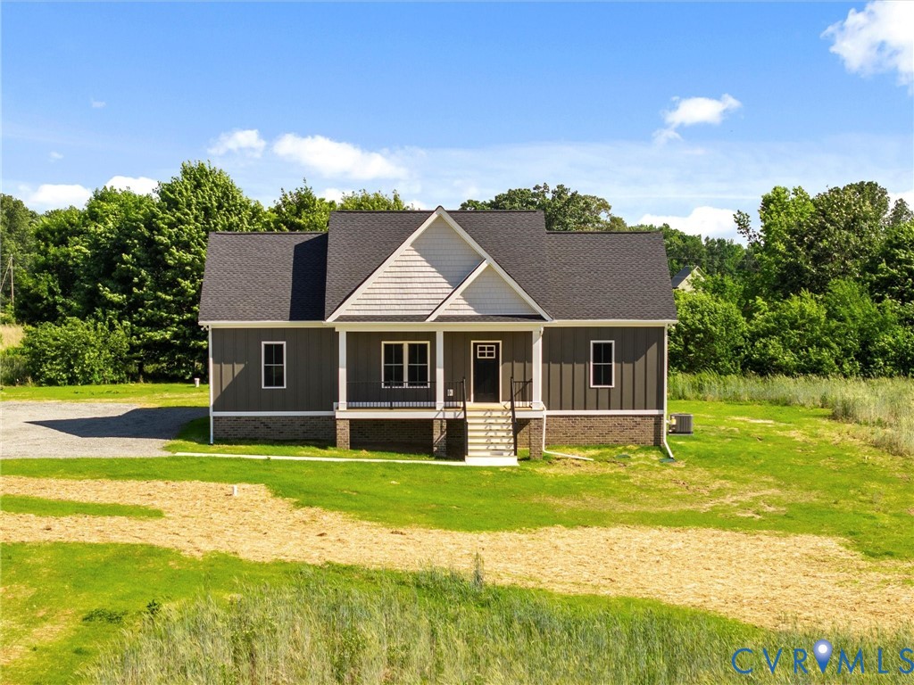 3289 Cumberland Road Cumberland, VA 23040 - Photo 29 of 29 a view of a house with a yard