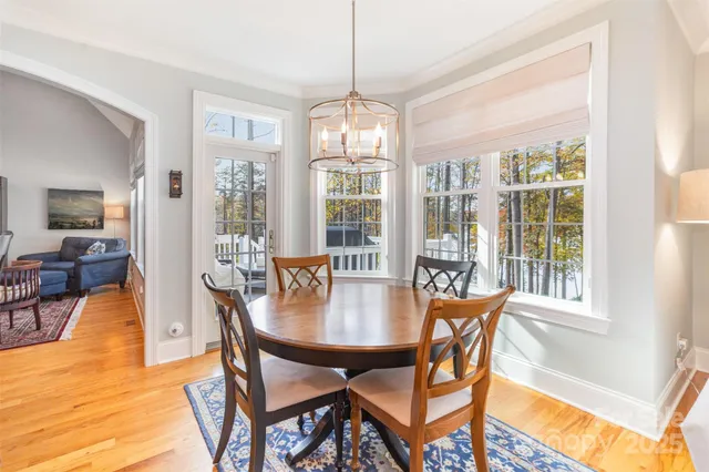a dining room with furniture window wooden floor