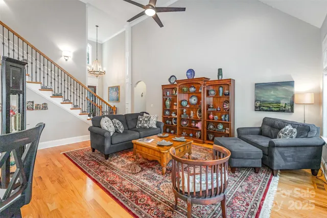 a living room with furniture and a rug