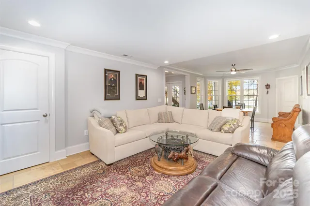 a living room with furniture or couch and a wooden floor