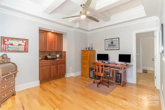 a view of a workspace with furniture and a livingroom