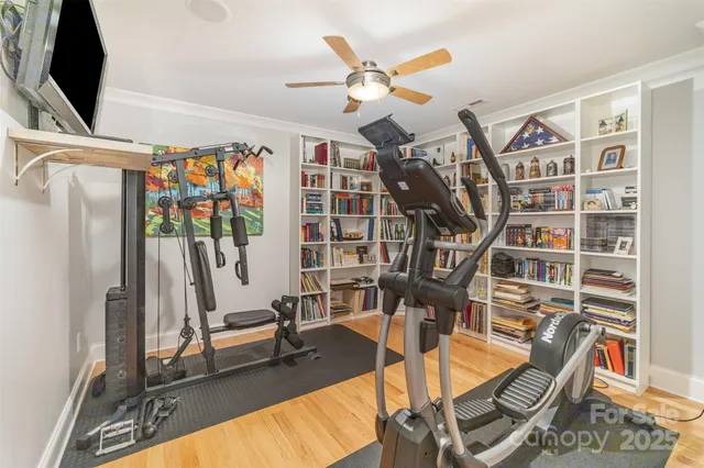a view of a livingroom with furniture and staircase