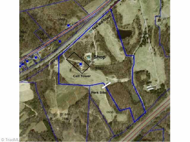 103 Benton Road Reidsville, NC 27320 - Photo 1 of 8 Exterior Front. Aerial showing tower, perk site, shop, saw mill shed