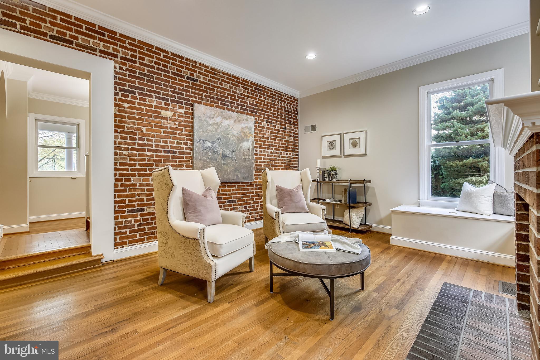 421 Kent Square Road Gaithersburg, MD 20878 - Photo 15 of 78 Family room w/exposed brick walls & cedar benches