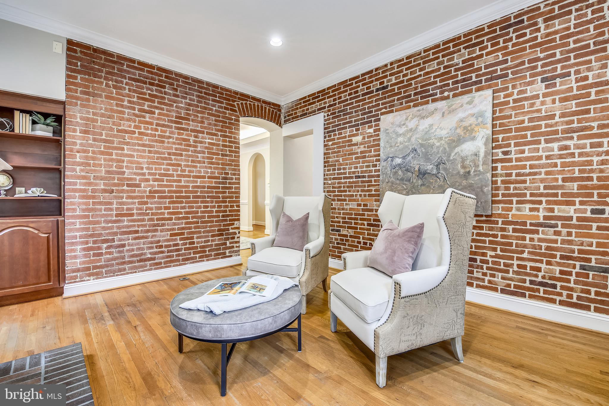 421 Kent Square Road Gaithersburg, MD 20878 - Photo 17 of 78 Family room w/wood built-ins & exposed brick