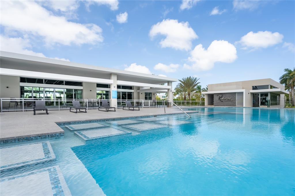 68 Riviera Village Bayamon, PR 00959 - Photo 12 of 14 a view of a swimming pool with outdoor seating